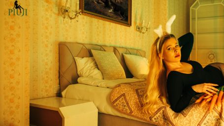 Elegant female escort in black evening dress